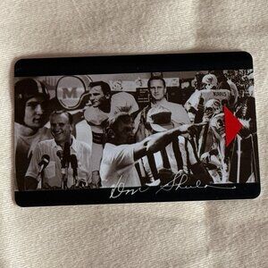 Collectible hotel key primarily identified by the signature of Don Shula